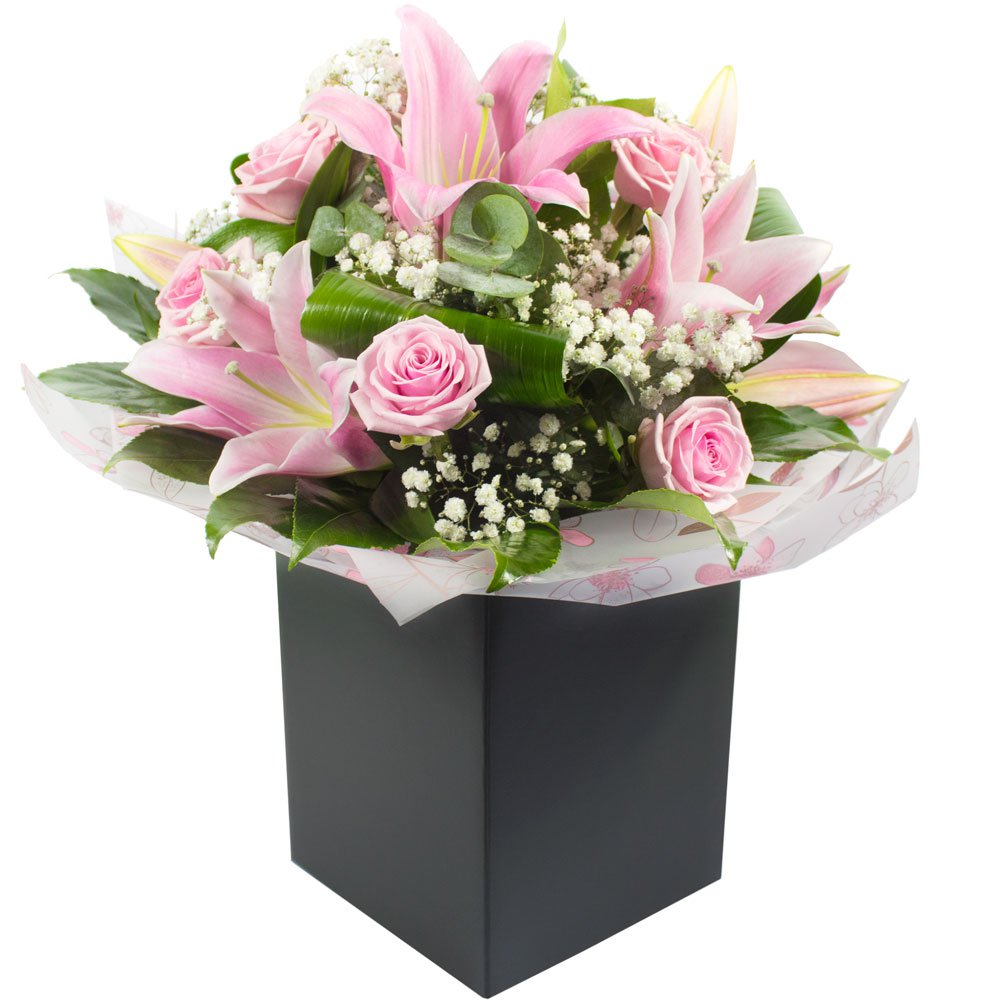 Sylvie a hand tied bouquet presented boxed and in water